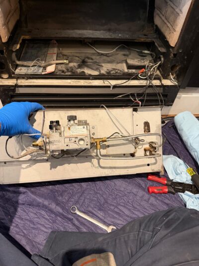 Fireplace Repair Vancouver by Licensed Gas Fireplace Technicians 2 Fireplace Repair Vancouver technician repairing a gas fireplace