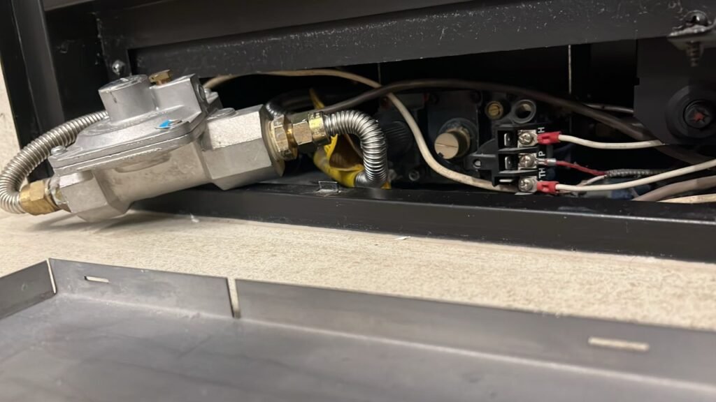 Gas fireplace with an unusual smell requiring professional insp